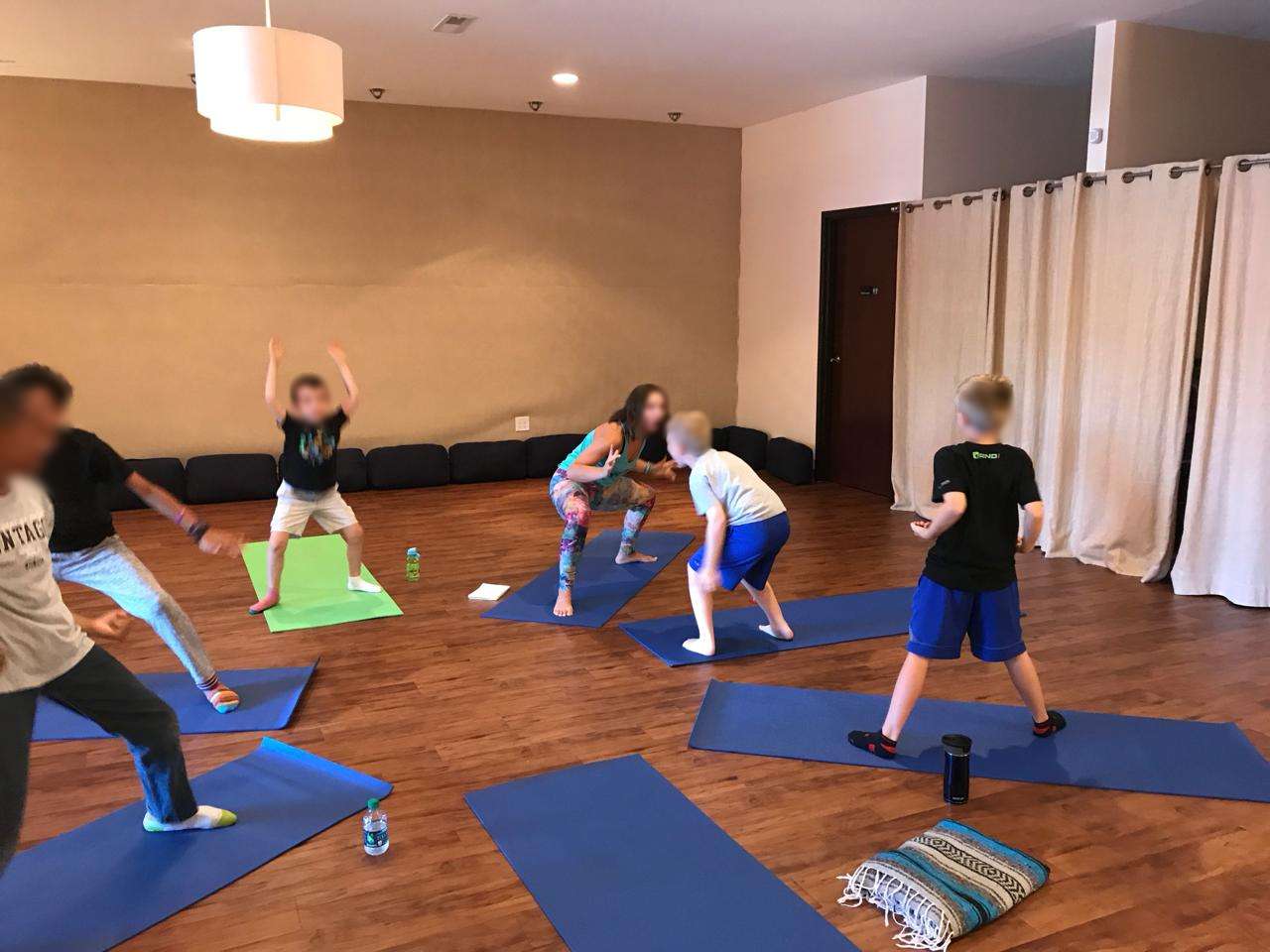 Kara with campers — high energy, genuine fun, every single afternoon
